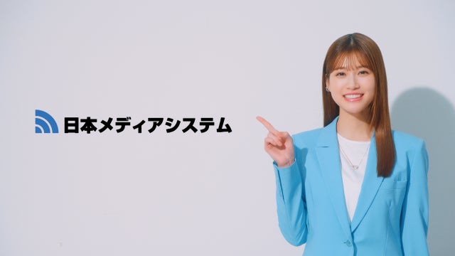 ⑦社名を指差しながら伝える生見さん。